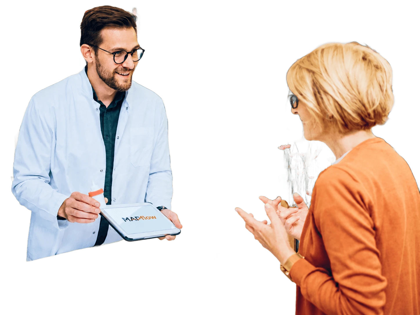 Pharmacist sharing information on a tablet with a patient